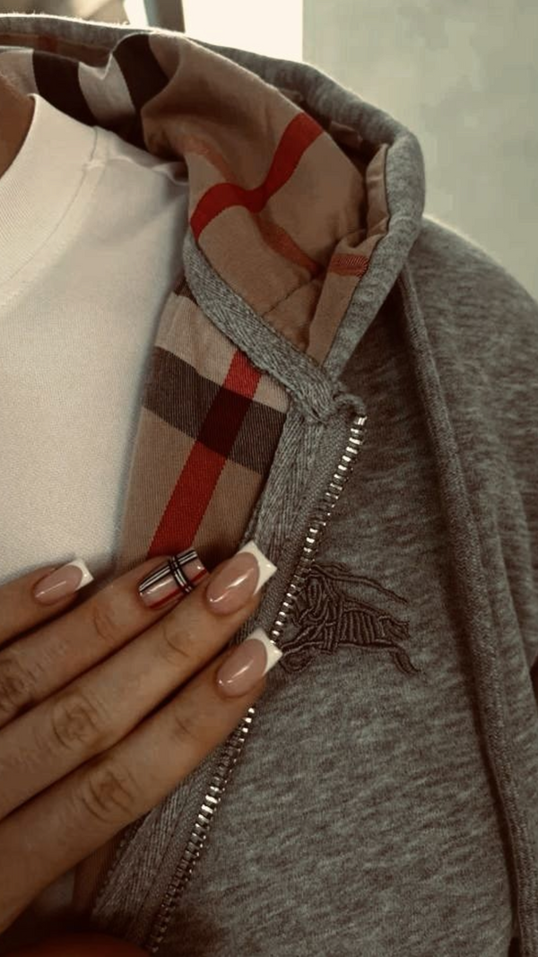 OUR CHEQUERED ZIPPER WORN WORLDWIDE