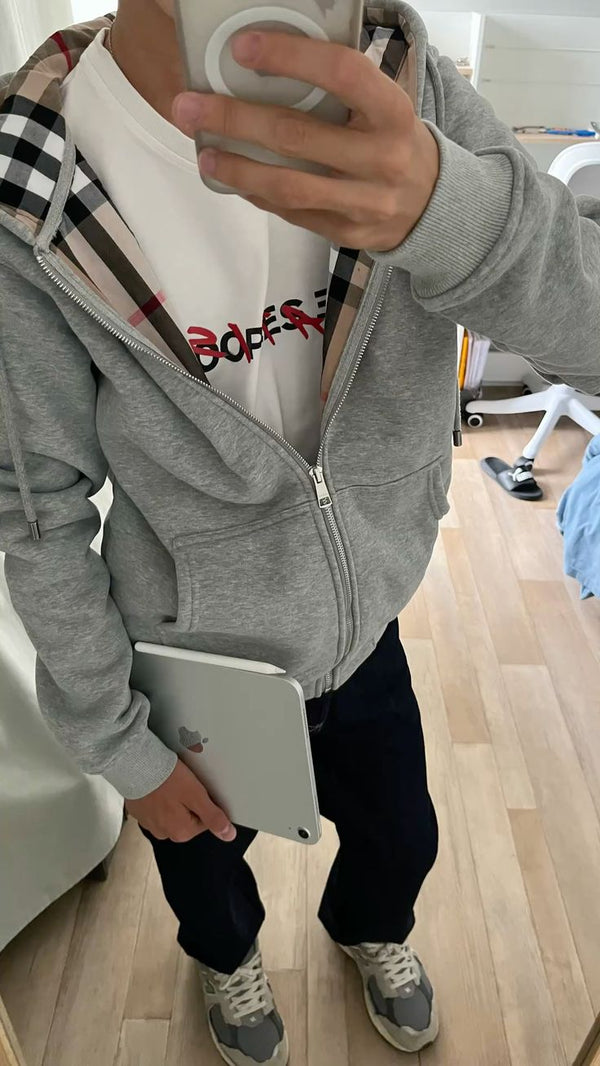 OUR CHEQUERED ZIPPER WORN WORLDWIDE