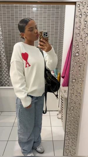 OUR AMI - HEART SWEATER WORN WORLDWIDE