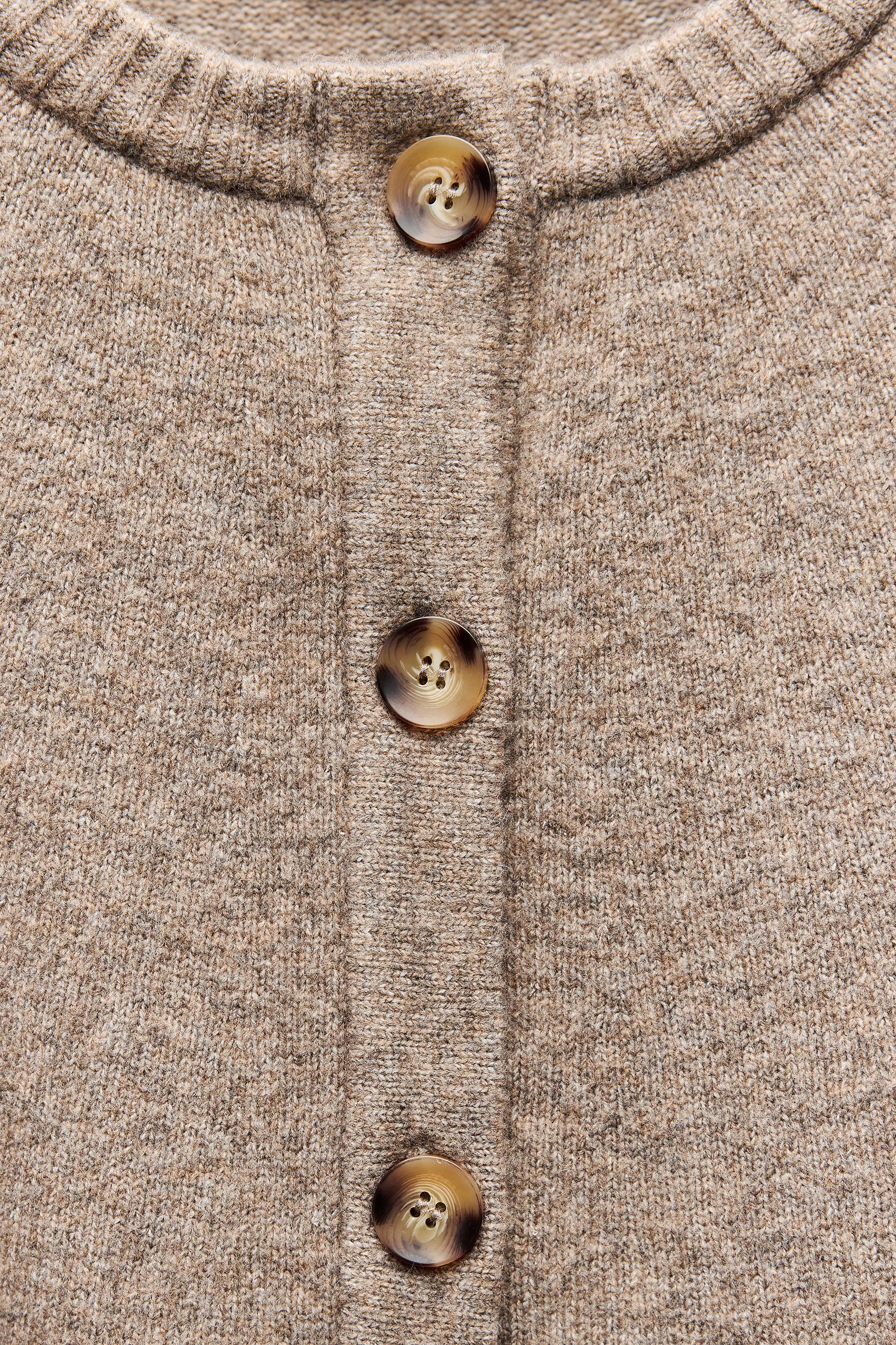 VESTE CAPE EN TRICOT