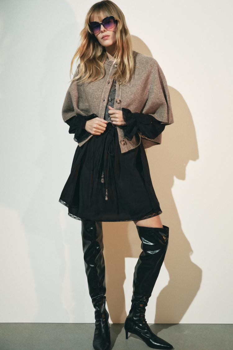 VESTE CAPE EN TRICOT