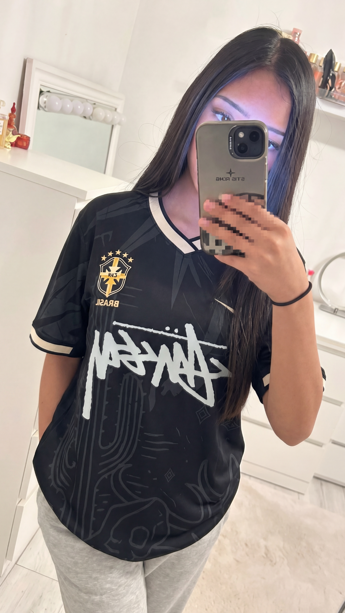 Customer wearing Essentials Tee